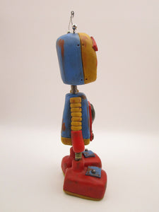 Robot Monster with metal heart and metal accents