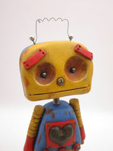 Robot Monster with metal heart and metal accents