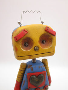 Robot Monster with metal heart and metal accents