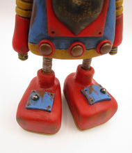 Robot Monster with metal heart and metal accents