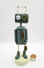 Robot character with metal robot charm