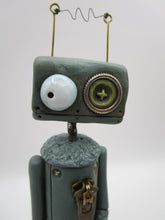 Robot character with metal robot charm