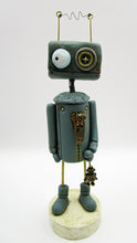 Robot character with metal robot charm