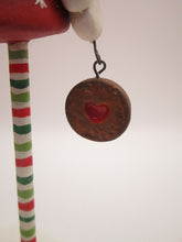 Christmas Santa Claus with strawberry jam cookie