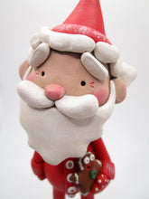 Christmas folk art Santa in pajama's with gingerbread cookie stuffy