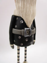 Christmas folk art Santa in black with wood legs - fabulous!