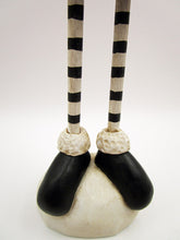 Christmas folk art Santa in black with wood legs - fabulous!