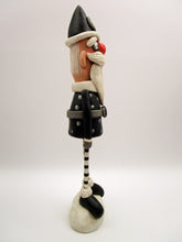 Christmas folk art Santa in black with wood legs - fabulous!