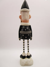 Christmas folk art Santa in black with wood legs - fabulous!