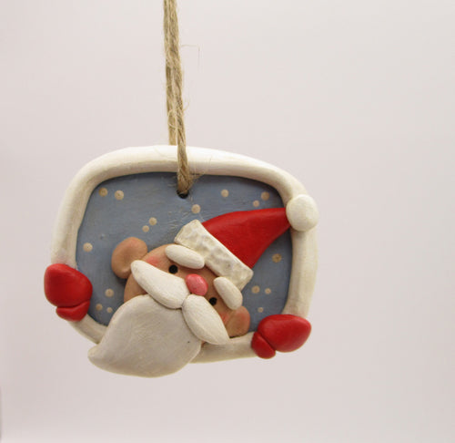 Christmas folk art ornament with Santa