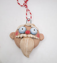 Christmas Santa ornament creepy and yet cute ready to hang on your tree