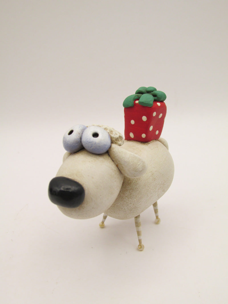 Christmas folk art small sheep with gift