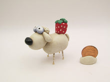 Christmas folk art small sheep with gift