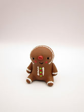 Christmas folk art small sitting Gingerbread man in honey brown