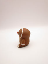 Christmas folk art small sitting Gingerbread man in honey brown