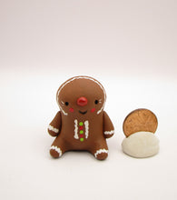 Christmas folk art small sitting Gingerbread man in honey brown