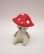 Spring folk art or Christmas folk art sitting mushroom character