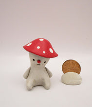 Spring folk art or Christmas folk art sitting mushroom character