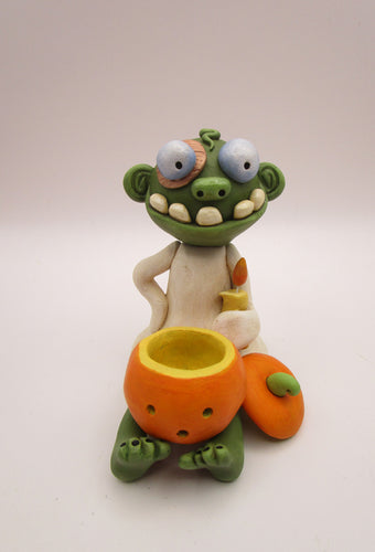 Halloween folk art sitting zombie with removable pumpkin