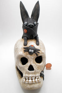 Halloween SKULL with sitting bat and two spiders - skull has fine crackle finish