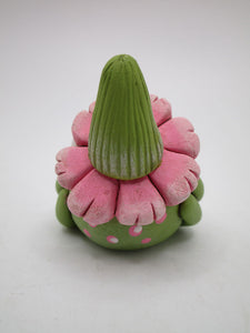 Spring folk art frog wearing pink flower hat with stem 1.75 tall