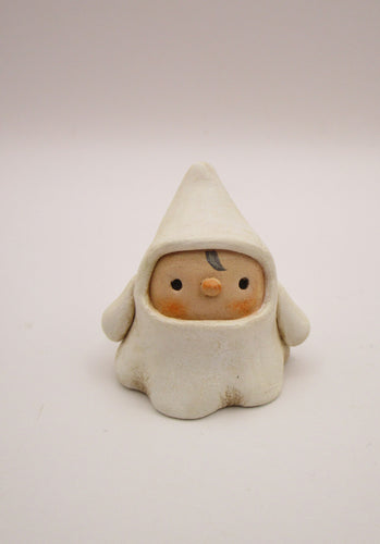 Halloween small boy in ghost costume
