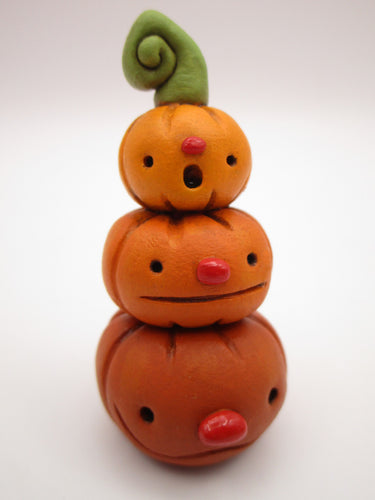 Halloween folk art small pumpkin stack