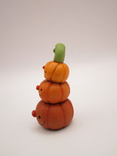 Halloween folk art small pumpkin stack