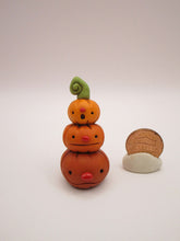 Halloween folk art small pumpkin stack