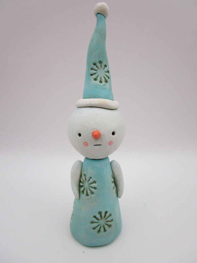 Christmas folk art snowman with snowflake like pattern