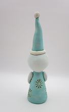Christmas folk art snowman with snowflake like pattern