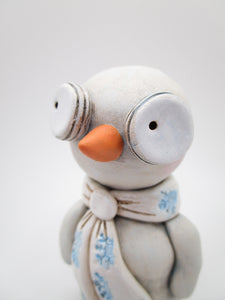 Christmas snowman with snowflake scarf