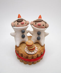 Christmas snow kids sitting on a jelly filled cookie CUTE