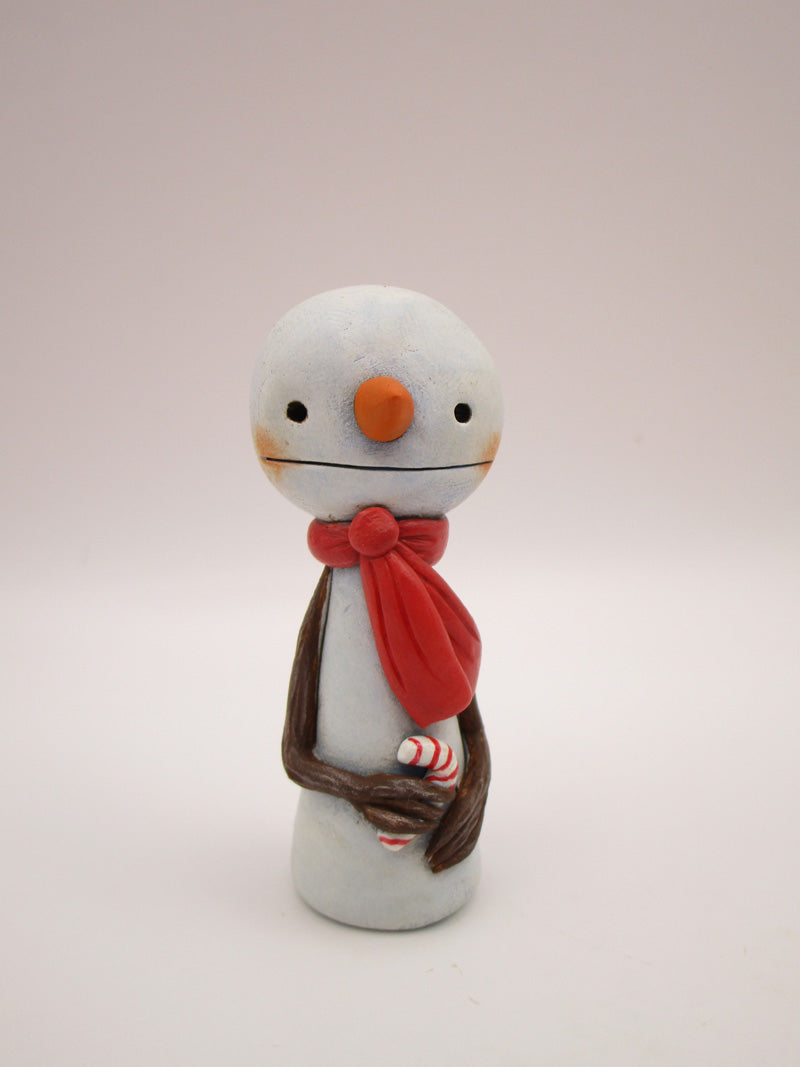 Christmas small snowman flat head and tiny gift in hand