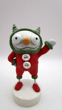 Christmas folk art sweet and creepy snowman in MONSTER costume waving hello