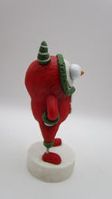 Christmas folk art sweet and creepy snowman in MONSTER costume waving hello