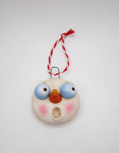 Christmas snowman head ornament (looking to the side) ready to hang