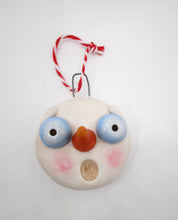 Christmas snowman head ornament ready to hang