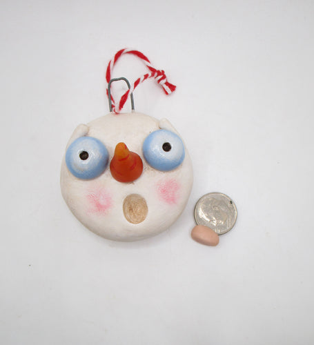 Christmas snowman head ornament ready to hang