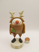 Christmas folk art snowman wearing reindeer costume