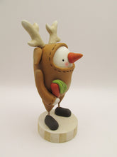 Christmas folk art snowman wearing reindeer costume