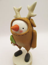 Christmas folk art snowman wearing reindeer costume