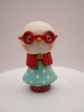 Christmas folk art small snowman snowgirl with red glasses a bit cheeky