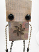 Wacky character 7.5 inch tall wood and metal robot with spin charm