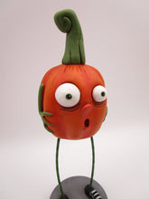Halloween folk art scared spooky pumpkin with long legs