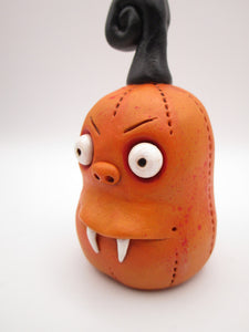 Halloween folk art pumpkin with FANGS