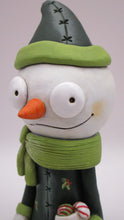 Christmas folk art snowman with stocking and big scarf