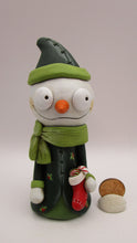 Christmas folk art snowman with stocking and big scarf