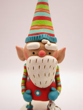 Christmas ELF with dog toy charm and lots of stripes