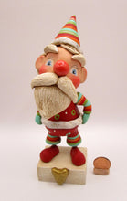 Christmas bohemian Santa with lots of stripes and crackle finish